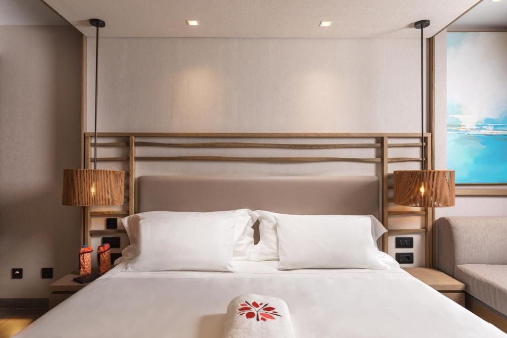 Detailaufnahme des Doppelbetts im Grand Doppel Zimmer des Angsana Corfu Resort