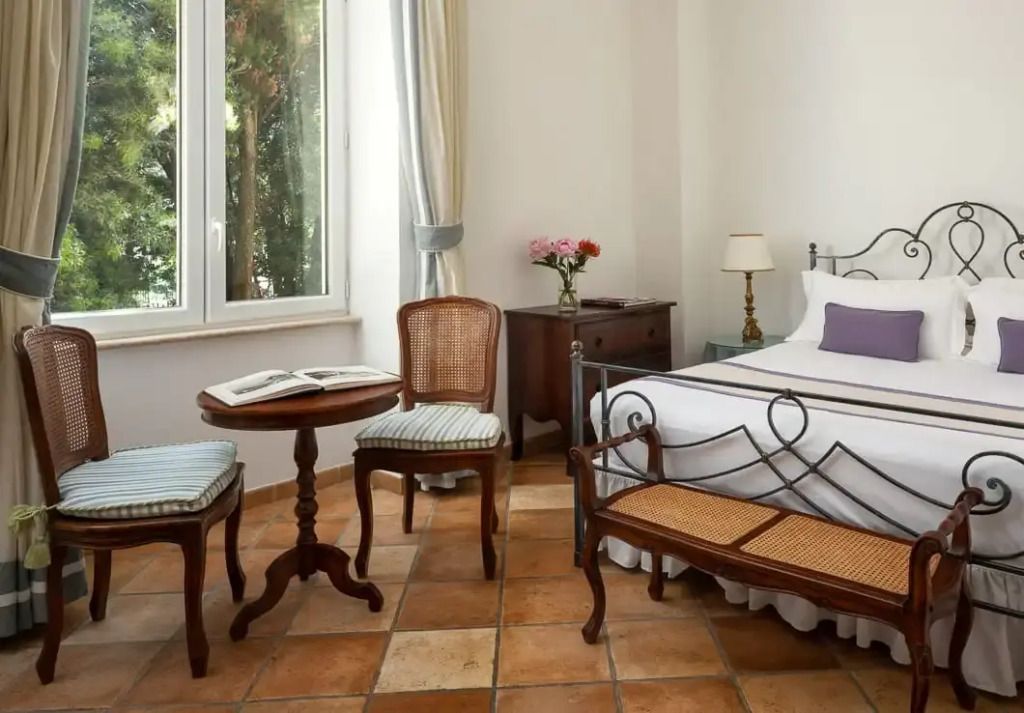 Superior Doppelzimmer mit Doppelbett, Terrakottaboden und eleganter Einrichtung