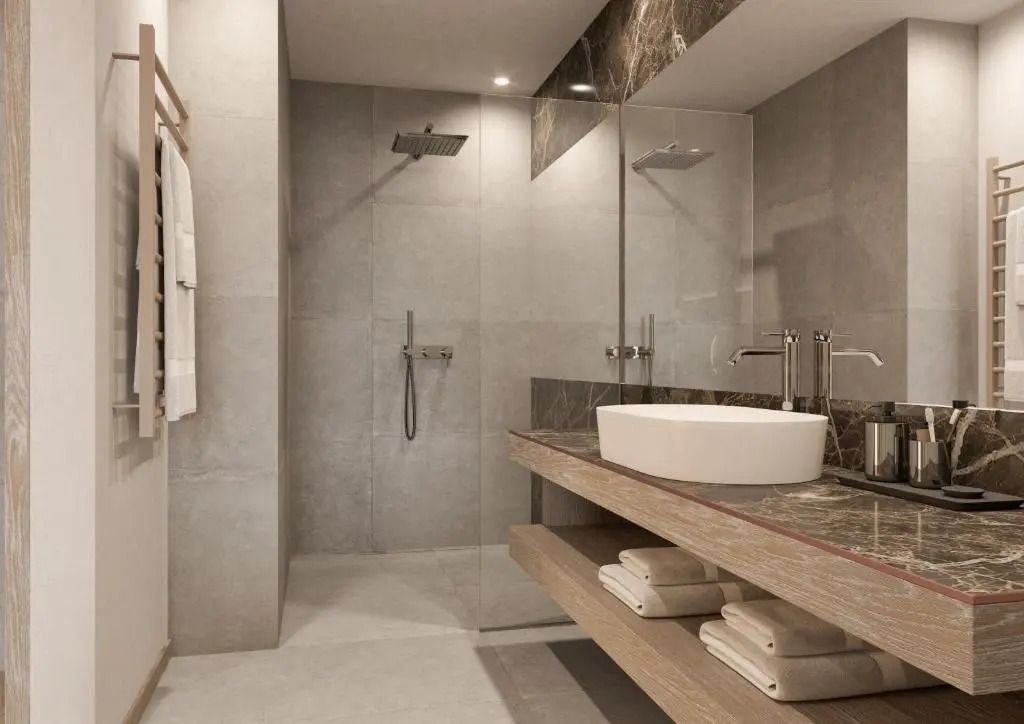 Modernes Badezimmer der Junior-Suite mit Regendusche und Doppelwaschbecken