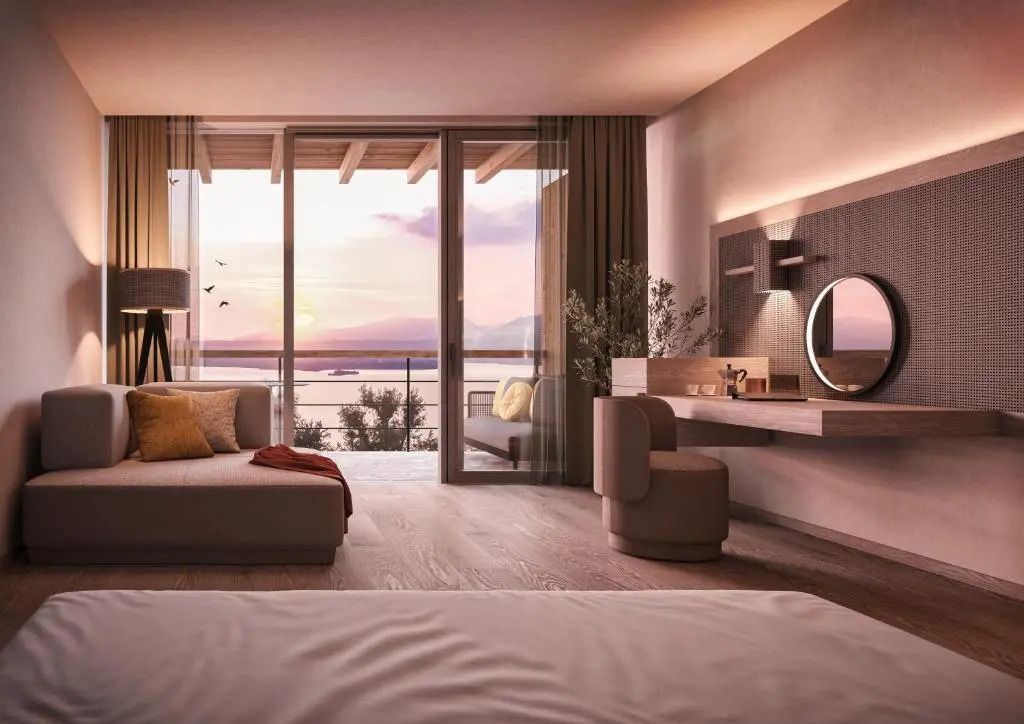 Elegantes Wohnzimmer mit Seeblick bei Sonnenuntergang