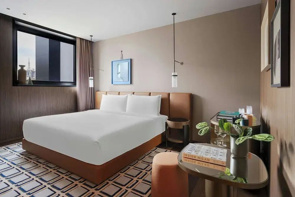 Helles Deluxe Doppelzimmer mit modernem Interieur und Doppelbett