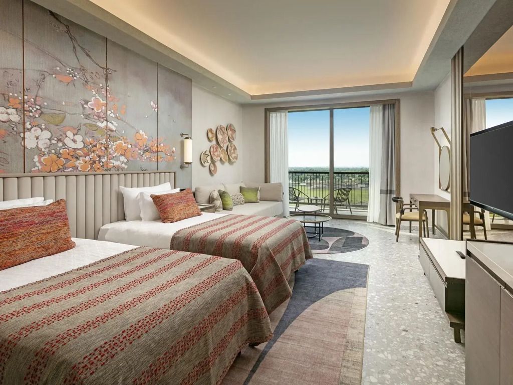 Elegantes Superior Doppelzimmer mit Doppelbett und moderner Dekoration