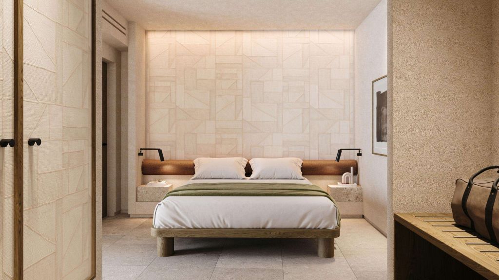 Modernes Doppelzimmer mit stilvollem Wanddesign und Doppelbett.