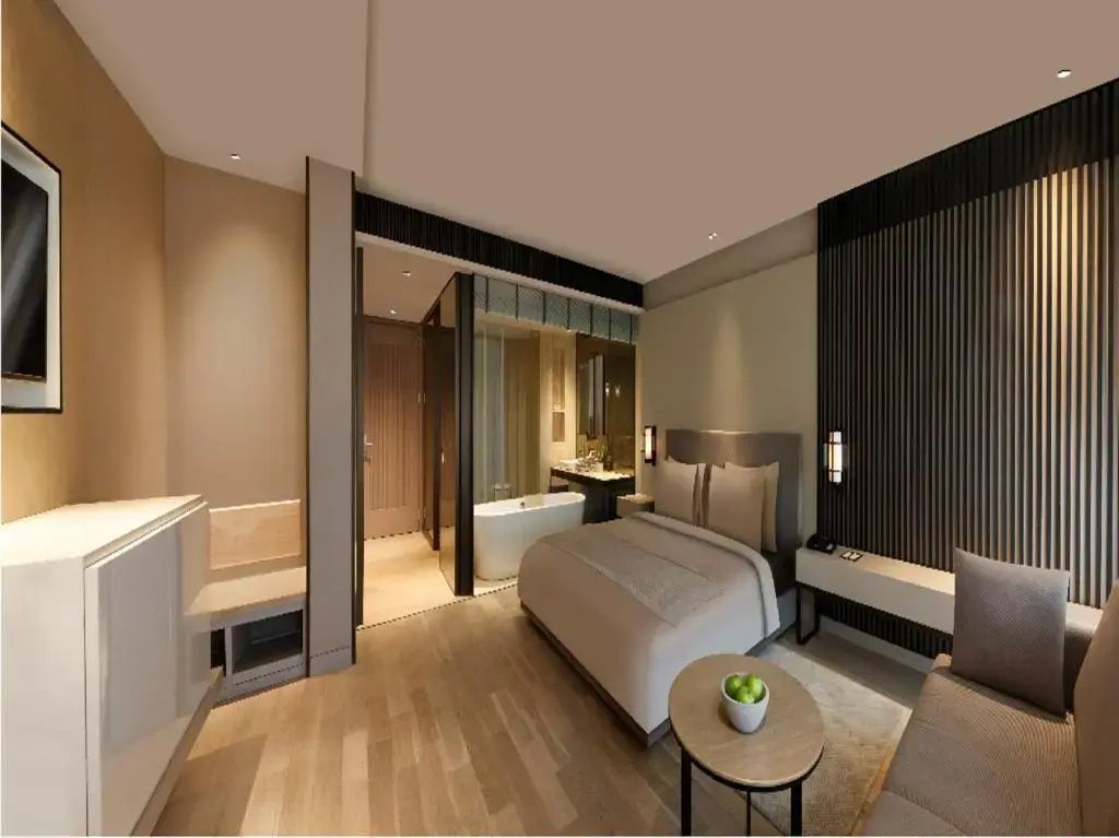 Geräumiges Club Doppelzimmer mit modernem Design und Doppelbett