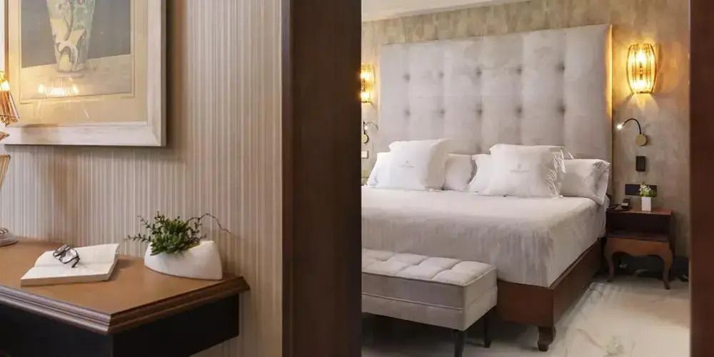 Elegante Junior-Suite mit Doppelbett in hellen Tönen und stilvoller Einrichtung