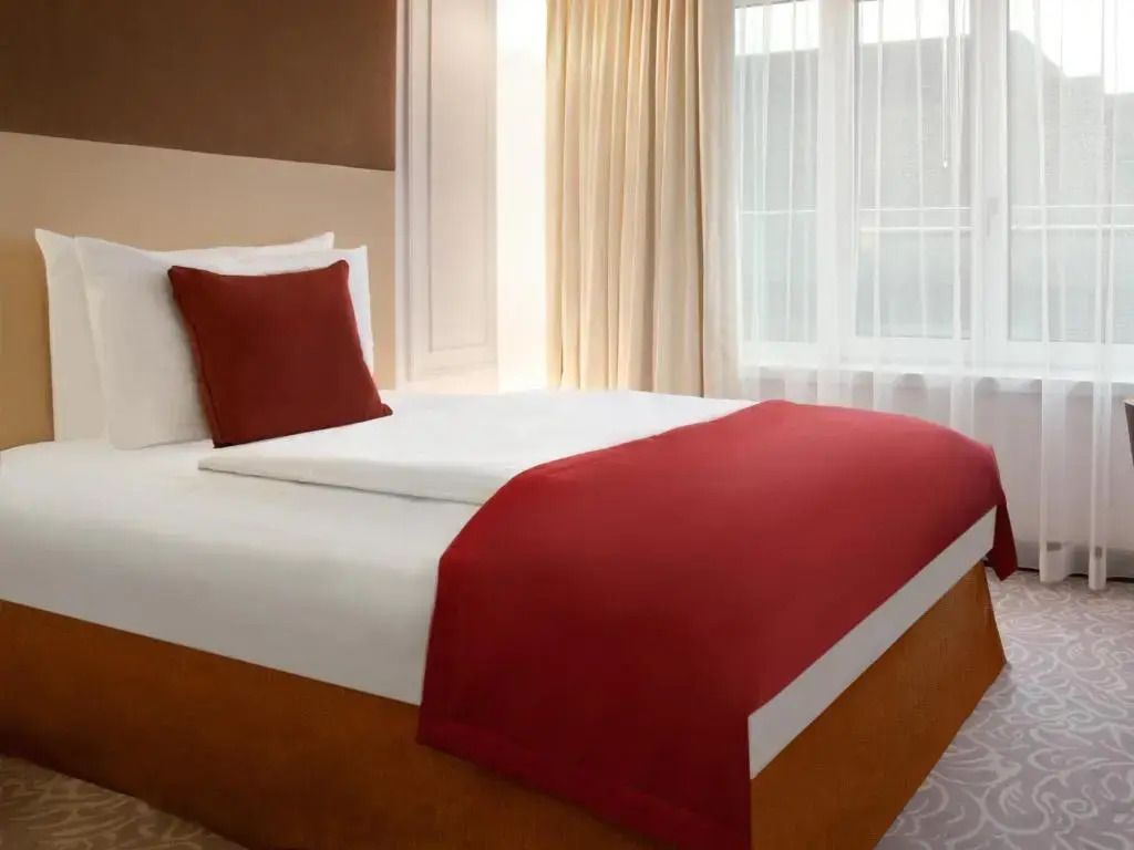Superior Einzelzimmer mit gemütlicher Bett und stilvoller Einrichtung