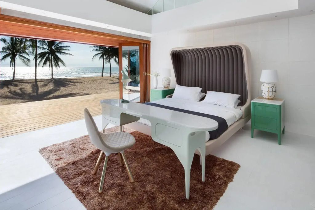 Moderne Suite mit Doppelbett und direktem Strandblick