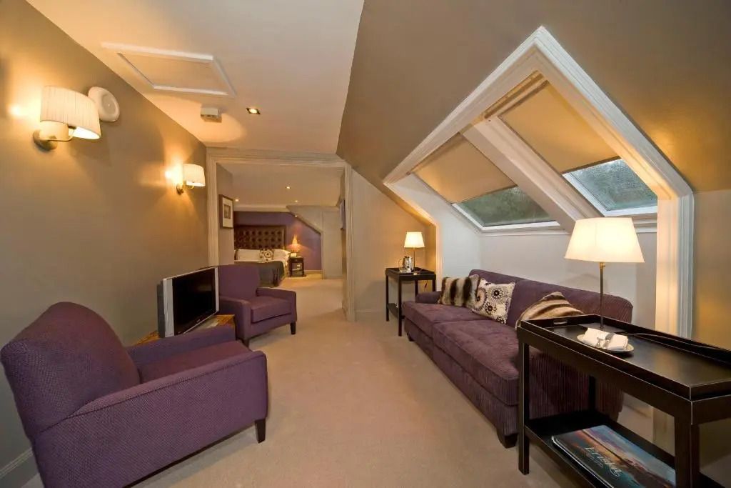 Gemütliche Suite mit Dachfenstern und luxuriösem Interieur