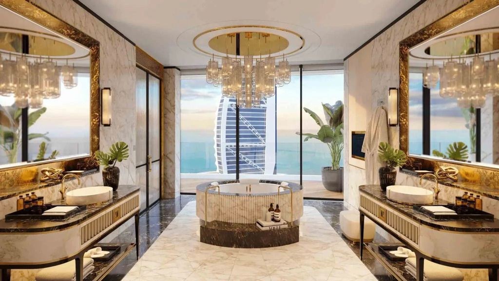 Luxuriöses Badezimmer mit freistehender Badewanne und Blick auf den Burj Al Arab.