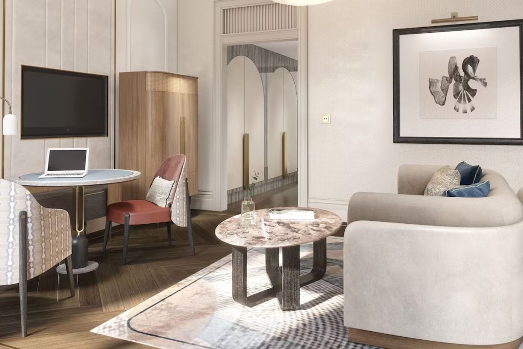 Elegantes Premier Deluxe Doppelzimmer mit stilvoller Einrichtung und bequemen Sitzgelegenheiten