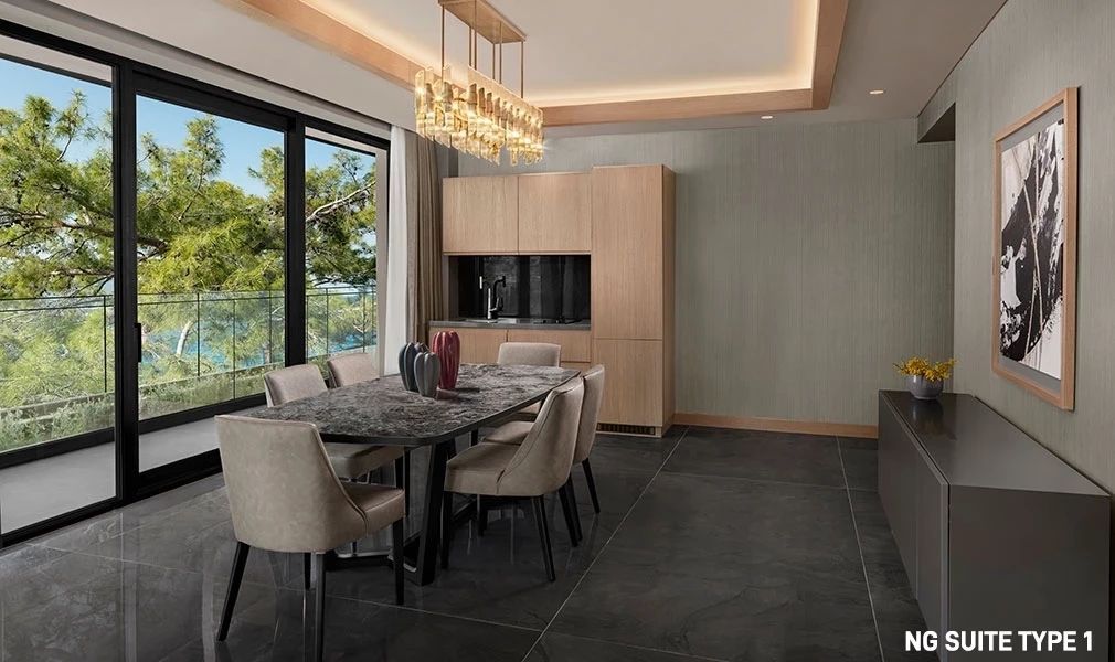 Essbereich mit eleganten Stühlen und großem Tisch in der NG Suite