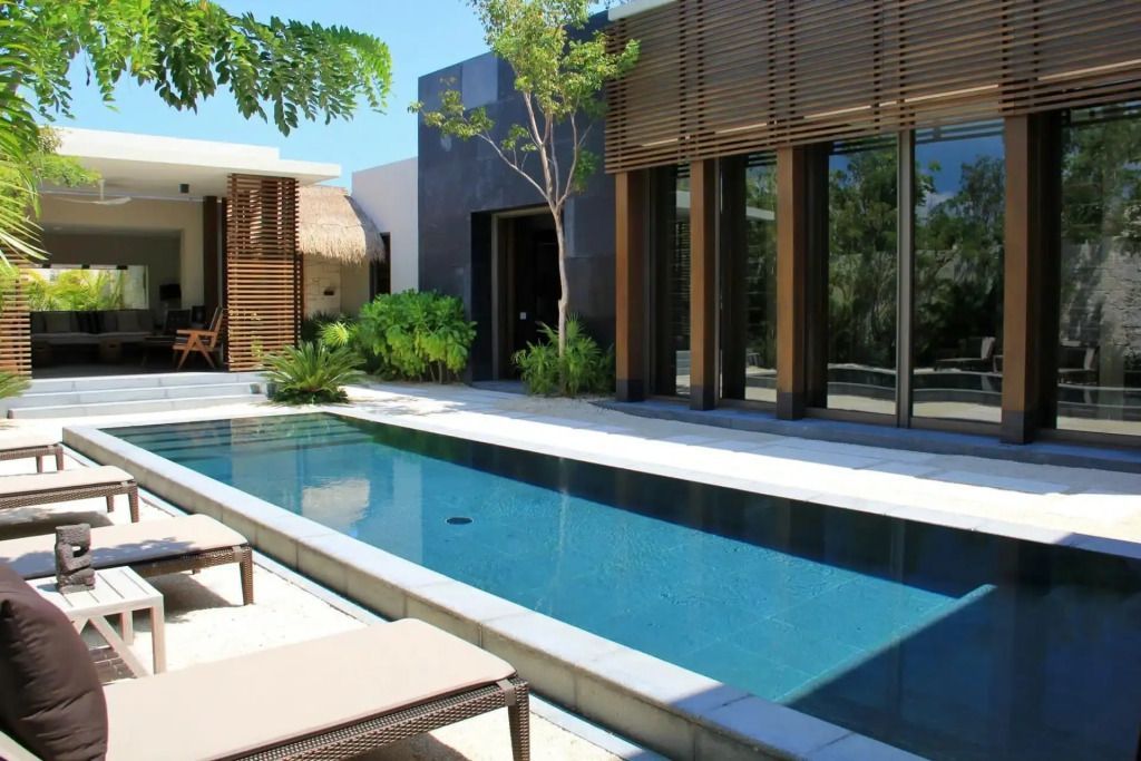 Private Villa mit Pool und moderner Architektur im NIZUC Resort and Spa.