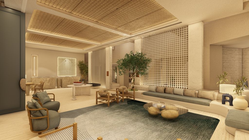 Stilvoller Loungebereich der Lobby mit warmen Naturtönen, Flechtelementen und gemütlichen Sitzmöbeln.