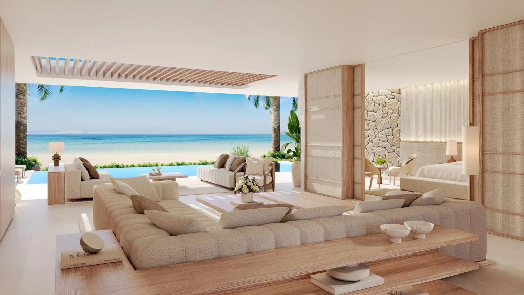 Geräumiges Wohnzimmer mit offenem Blick auf das Meer und luxuriöser Ausstattung