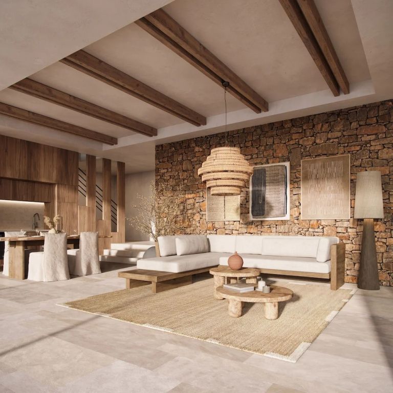 Stilvoll eingerichtetes Wohnzimmer mit Natursteinwand und moderner Einrichtung