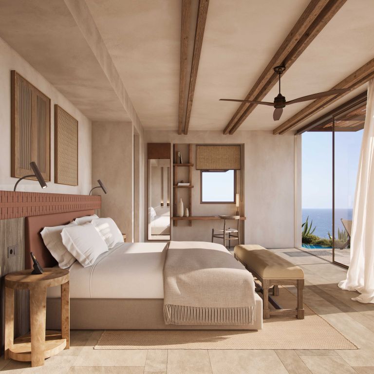 Modern eingerichtetes Schlafzimmer mit Meerblick und natürlichen Holzelementen