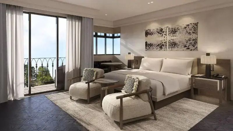 Geräumige Junior-Suite mit Kingsize-Bett und Balkon im Park Hyatt Johannesburg.