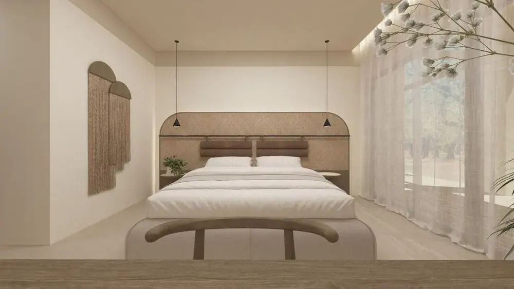 Standard Zimmer mit komfortablen Doppelbett und minimalistischer Wandgestaltung.