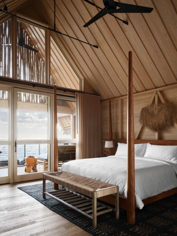 Cozy Schlafzimmer mit Baldachinbett und Meerblick im Kona Village Resort