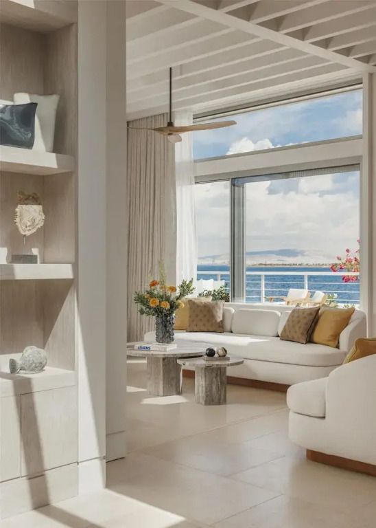 Luxuriöses Wohnzimmer mit Meerblick und stilvoller Inneneinrichtung in der Ilios Villa
