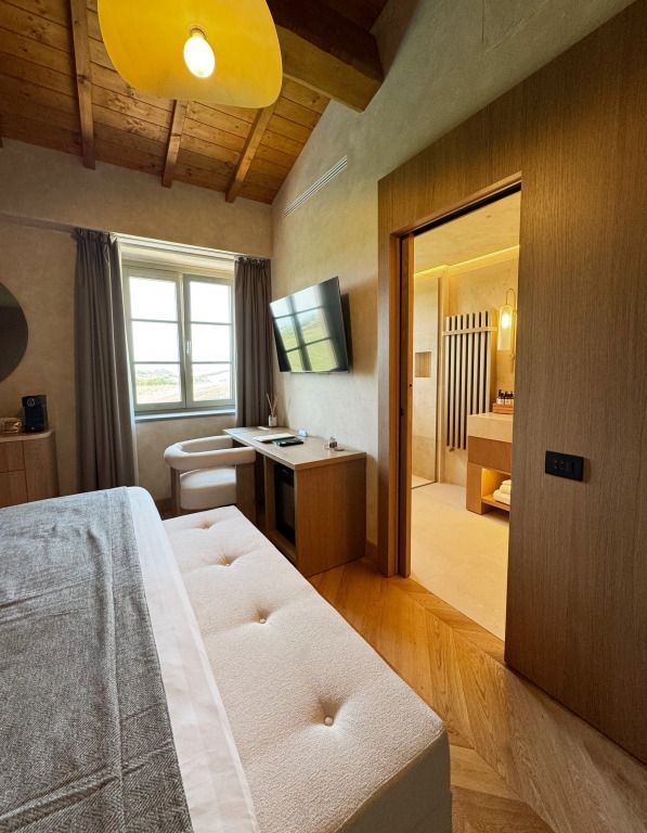 Suite mit harmonischer Kombination aus Schlaf- und Badezimmer