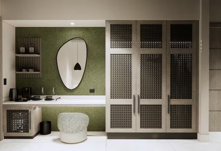 Moderne Kochnische mit elegantem Spiegel und grünen Akzenten