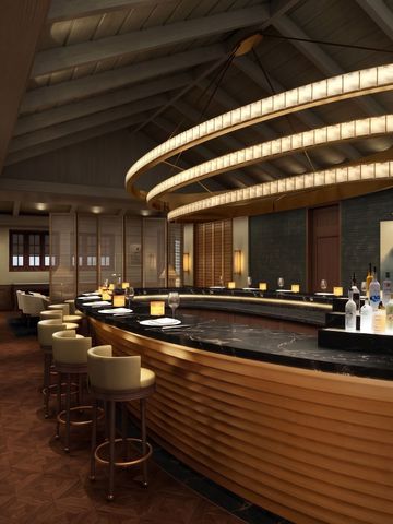 Stilvolle Hotelbar mit moderner Beleuchtung und eleganter Theke