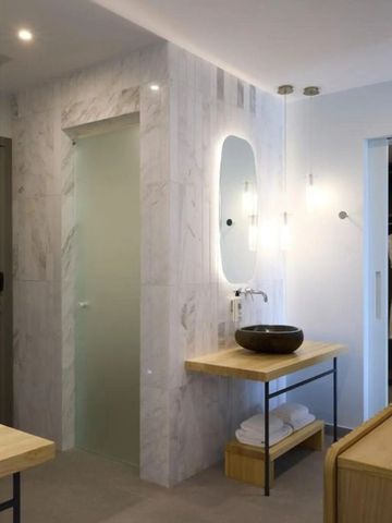 Geräumiges Badezimmer mit moderner Ausstattung im Cayo Exclusive Resort & Spa