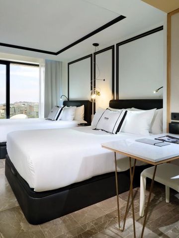 Luxuriöses Doppelzimmer mit Meerblick und modernem Interieur
