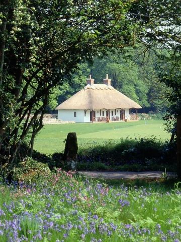 Reetgedecktes Häuschen im Grünen des Gidleigh Park Hotel