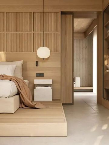 Modernes Zimmerdesign mit Holzdetails und komfortablem Bett