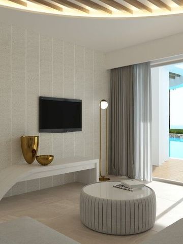Modernes Hotelzimmer mit stilvoller Dekoration und Poolblick durch großes Fenster