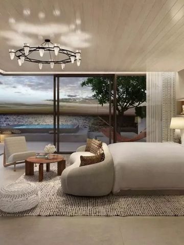 Luxuriöses Schlafzimmer mit Blick auf das Meer und privatem Pool
