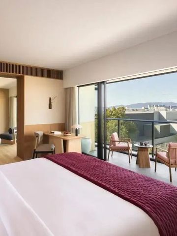 Zimmer mit Balkon und Panoramablick auf Kyoto