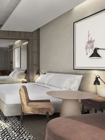 Modernes Hotelzimmer mit Doppelbett und stilvollen Möbeln
