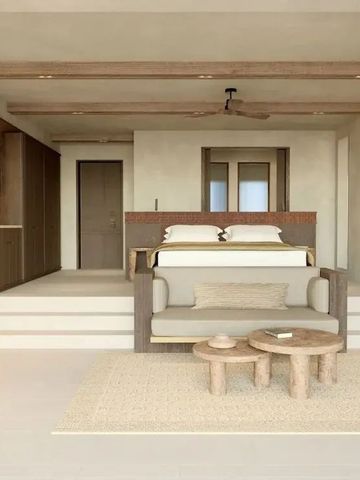 Elegantes Hotelzimmer mit modernem Design und gemütlicher Sitzecke