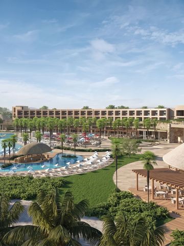 Weitläufige Resortanlage mit Pools und Palmen