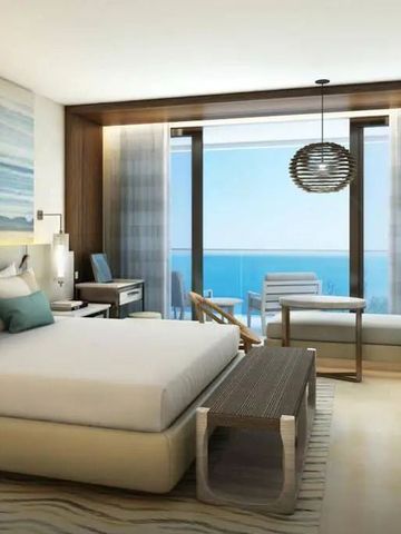 Modernes Hotelzimmer mit Designermöbeln und Blick auf das Meer