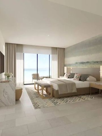 Geräumiges Schlafzimmer mit Blick auf das Meer und ansprechendem Design