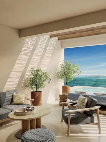 Private Terrasse mit Meerblick, Sonnenliegen und gemütlichem Sitzbereich