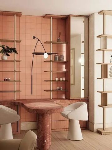 Eleganter Schminkbereich mit rosa Akzenten und modernen Regalen