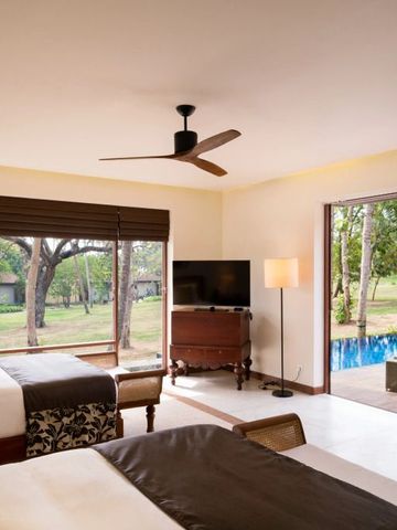 Doppelbettzimmer mit direktem Zugang zum privaten Pool