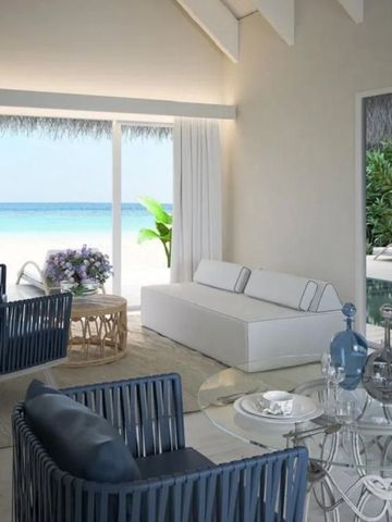 Luxusvilla mit eleganten Möbeln und Meerblick im Baglioni Resort Maldives.