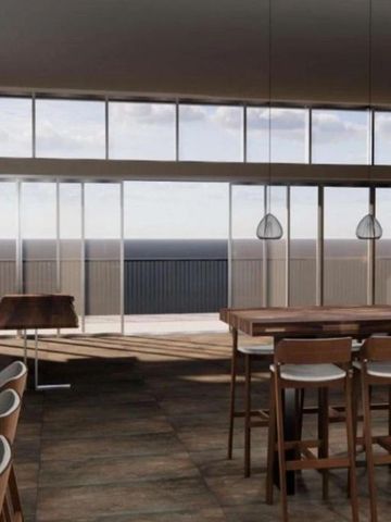 Lounge-Bereich mit Panoramablick und hölzerner Einrichtung