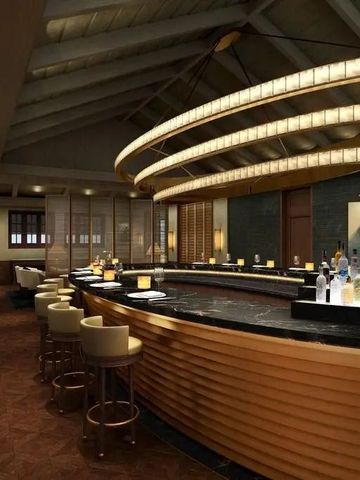 Stilvolle Hotelbar mit moderner Beleuchtung und eleganter Theke