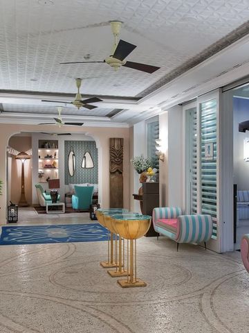 Moderne Lounge mit stilvollen Sitzecken und Pflanzen im Capri Tiberio Palace