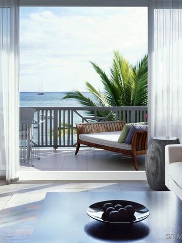 Offener Wohnbereich mit Meerblick und geschmackvoller Einrichtung