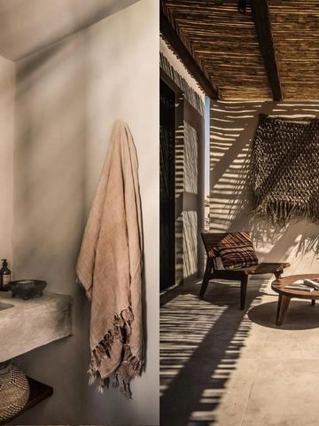 Elegantes Badezimmer mit modernen Oberflächen und stimmungsvoller Beleuchtung