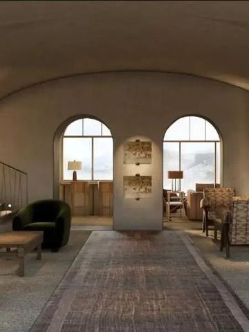 Elegante Lounge mit großzügigen Sitzbereichen und gewölbter Decke