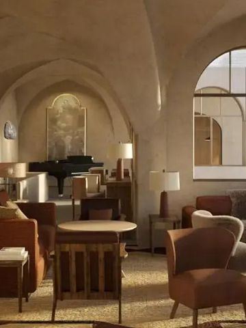 Elegante Lounge mit Gewölbedecke und stilvollen Möbeln